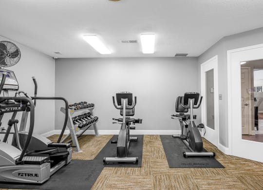 the gym with exercise equipment at Bay Pointe Apartments in Lafayette, Indiana