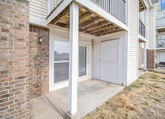 a private patio with enclosed storage at Black Sand Apartment Homes in Lincoln, NE