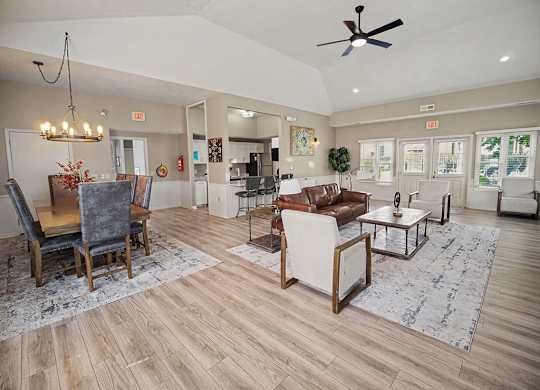 Clubhouse lounge with vaulted ceiling and modern furnishings at Black Sand Apartments Homes, Nebraska