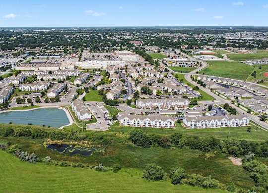 Aerial view of apartment complex with retention ponds at Black Sand Apartments Homes, Lincoln