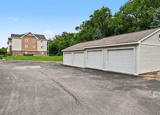 Garages with remote openers at Brentwood Park Apartments in LaVista, NE