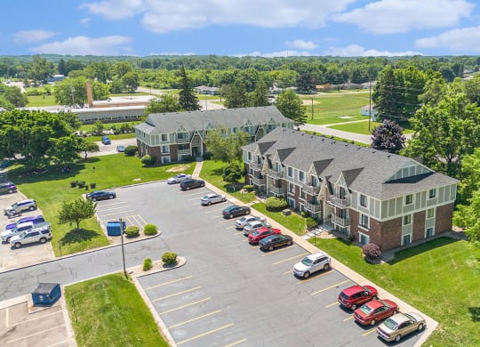 an aerial view with shade trees and green lawns at Briarwood Apartments, Benton Harbor, Michigan