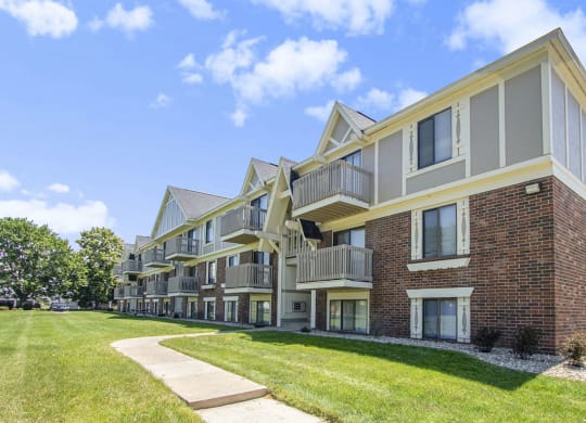 Attractive apartment building with green courtyard at Briarwood Apartments, Benton Harbor, Michigan