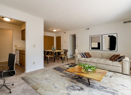 a living room with a couch and a table at Brook Pines, Columbia, 29210