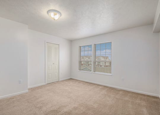Spacious bedroom with large windows  at Black Sand Apartment Homes, Lincoln, NE