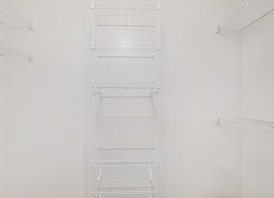 walk in closet with white shelves  at Black Sand Apartment Homes, Nebraska, 68504