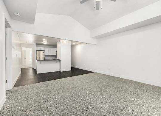 two bedroom living room with cathedral ceiling  at Byron Lakes Apartments, Michigan