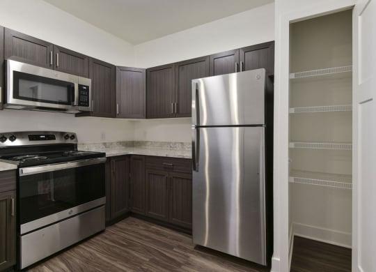 Built In Microwave and Pantry In Kitchen at Chase Creek Apartment Homes, Alabama, 35811
