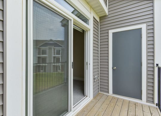 Slider to Balcony with Enclosed Storage at Chase Creek Apartment Homes, Huntsville, AL, 35811