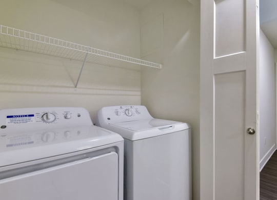 Laundry Room with Washer and Dryer at Chase Creek Apartment Homes, Huntsville, AL, 35811