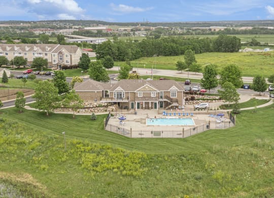 Aerial View of Pool With Large Sundeck at Colonial Pointe at Fairview Apartments, Nebraska