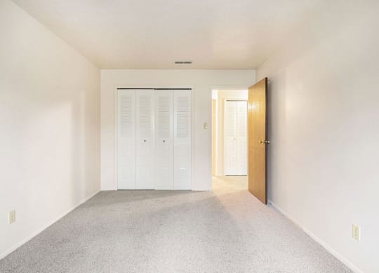Bedroom with Large Closet at Concord Place Apartments in Kalamazoo, Michigan 49009