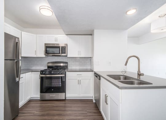 Two Bedroom Kitchen with Breakfast Bar at The Crossings Apartments, Grand Rapids, Michigan