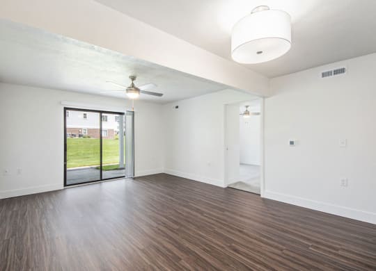 Two Bedroom Living Room with Ceiling Fan at The Crossings Apartments, Grand Rapids, Michigan