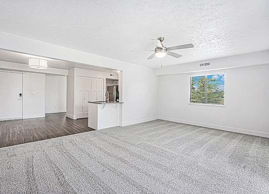 end living room leading to the kitchen at The Crossings Apartments, Michigan, 49508