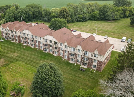 an aerial view of a large apartment complex with a grassy area in front of it at Beacon Hill and Great Oaks Apartments, Rockford, 61109