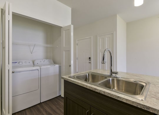 Washer And Dryer In Unit at Dodson Pointe Apartment Homes, Rogers, Arkansas