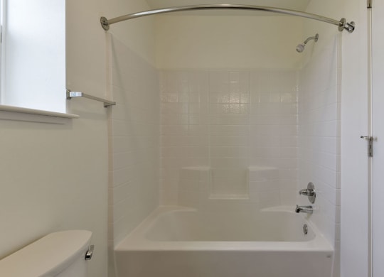 Modern Bathtub and Shower at Dodson Pointe Apartment Homes, Rogers, AR, 72758