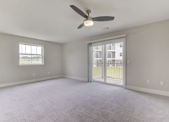 End with Enlarged Living Room at Dodson Pointe Apartment Homes, Rogers, AR, 72758