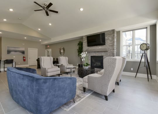 Community building with fireplace wall at Dodson Pointe Apartment Homes in Rogers, AR