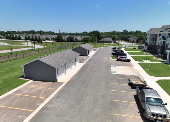 Aerial View of Parking Lot with Garages at Dodson Pointe Apartment Homes, Rogers, AR
