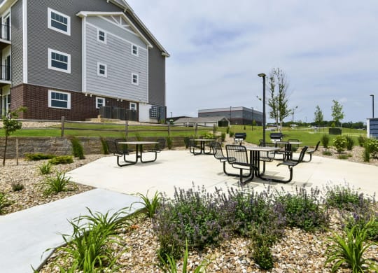 Outdoor Grills With Intimate Seating Area at Dodson Pointe Apartment Homes, Rogers, AR, 72758