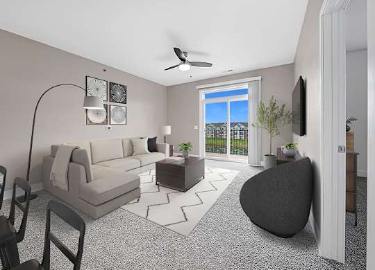 A modern living room with a 9' ceiling, ceiling fan, and a grey sofa at Dodson Pointe Apartment Homes, Rogers