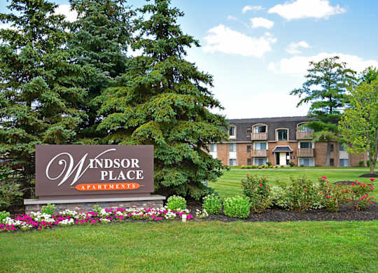the sign in front of the windsor place apartments at Windsor Place Apartments, Davison, 48423