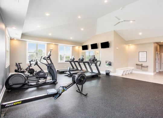 treadmills and TVs in fitness center at Eagle Ridge Apartment Homes,  Michigan 49685