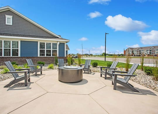 Fire pit with seating at Eagle Ridge Apartment Homes,  Michigan