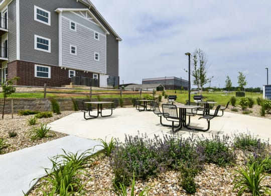 Grills with seating area at Eagle Ridge Apartment Homes, Traverse City, MI