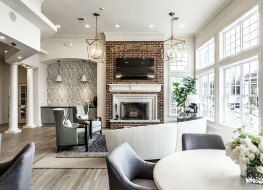TV seating and coffee bar in the clubhouse at Alexandria of Carmel Apartments, Carmel, IN, 46032