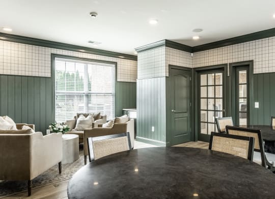 Tables and chairs in leasing center at Alexandria of Carmel Apartments, Carmel, Indiana