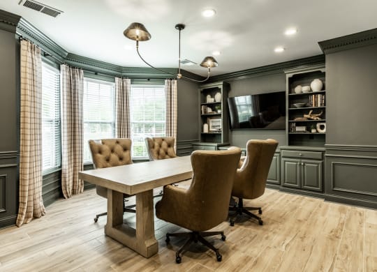 Clubhouse business center with conference table at Alexandria of Carmel Apartments, Indiana