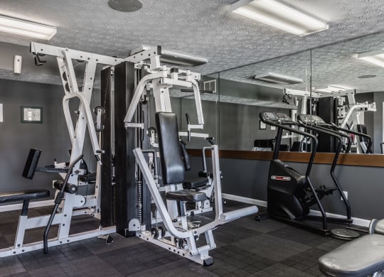 a gym with various exercise equipment at Bavarian Village Apartments, Indianapolis, Indiana