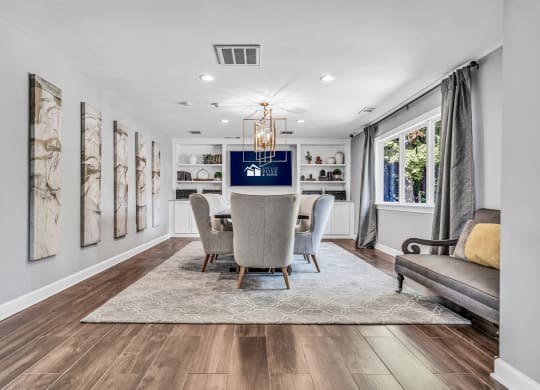 a dining room with a table and chairs and a window at Trophy Club at Bellgrade, Midlothian, VA, 23113