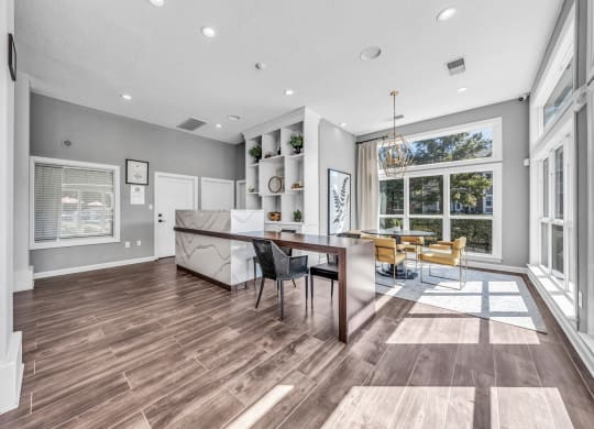 a dining room with a glass table and a large window at Trophy Club at Bellgrade, Midlothian, VA, 23113