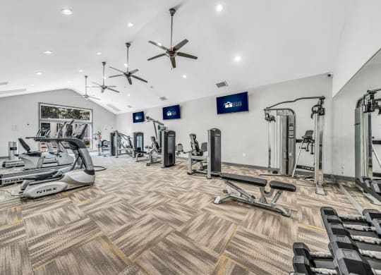 the gym is equipped with treadmills and other exercise equipment at Trophy Club at Bellgrade, Midlothian, VA, 23113