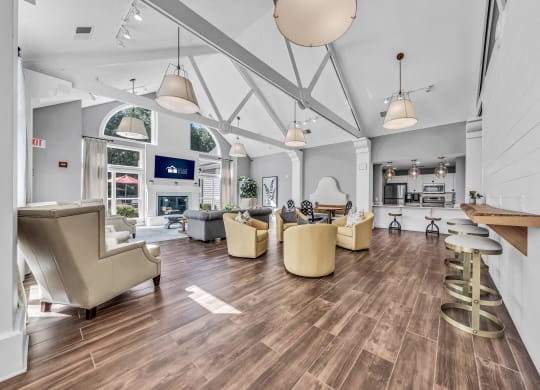 a large living room with couches and chairs and a fireplace at Trophy Club at Bellgrade, Midlothian, VA, 23113