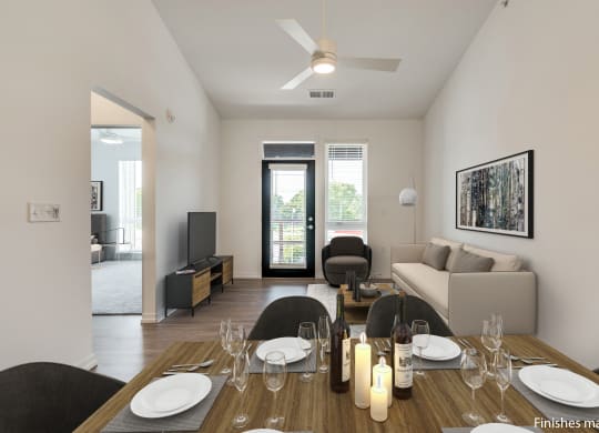 a dining area with a wooden table and chairs and a living room with a couch and a  at Uptown Square Apartments, Michigan, 48083