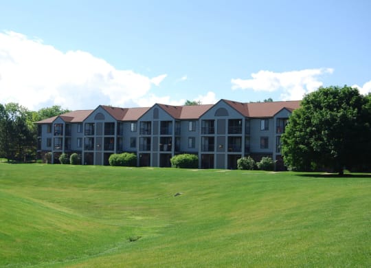 Rolling Green Lawns with Mature Shade Trees at Emerald Park Apartments, MI 49001