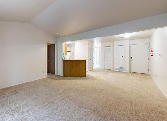 A large living room with a high ceiling at Emerald Park Apartments, Michigan