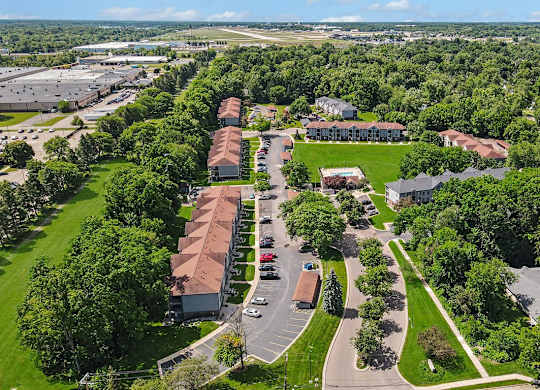 An aerial view of a residential area with apartment buildings at Emerald Park Apartments in Kalamazoo, MI