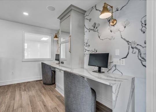 office with a marble desk and a mirror at The Vinings Apartments in Richmond, VA