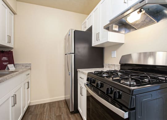 a kitchen with stainless steel appliances at Old Farm Apartments, Elkhart, Indiana