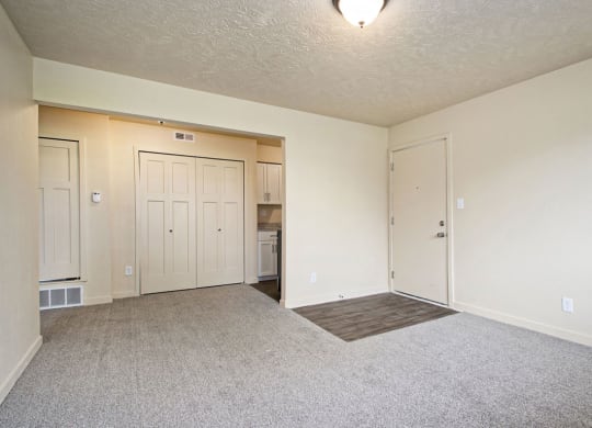 living and dining room leading to kitchen at Old Farm Apartments, Elkhart, Indiana