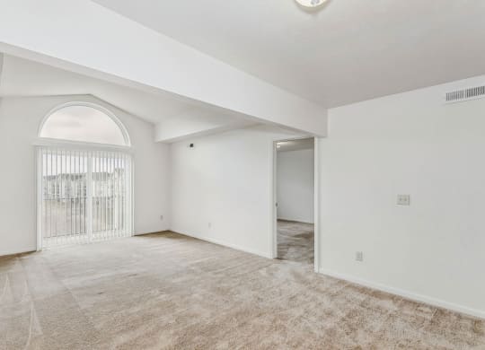 Two bedroom living room with a cathedral ceiling at Fieldstream Apartment Homes, Iowa, 50023