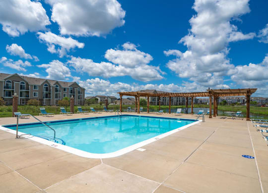 Swimming Pool with Lounge Seating at Fieldstream Apartment Homes, Ankeny, Iowa