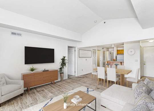a dining room with a high ceiling at Fieldstream Apartment Homes, Iowa