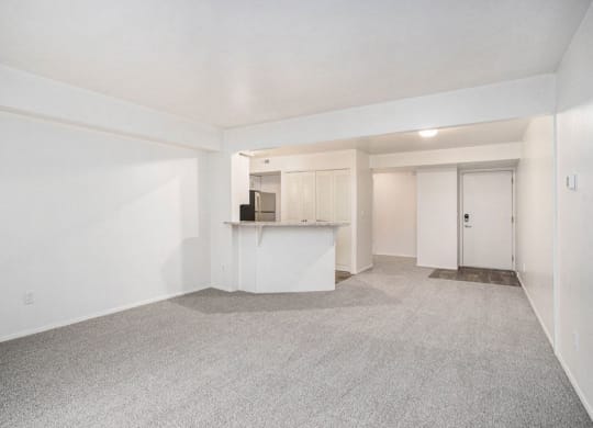 the dining room and kitchen of an upgraded apartment at Glenn Valley Apartments in Battle Creek, MI